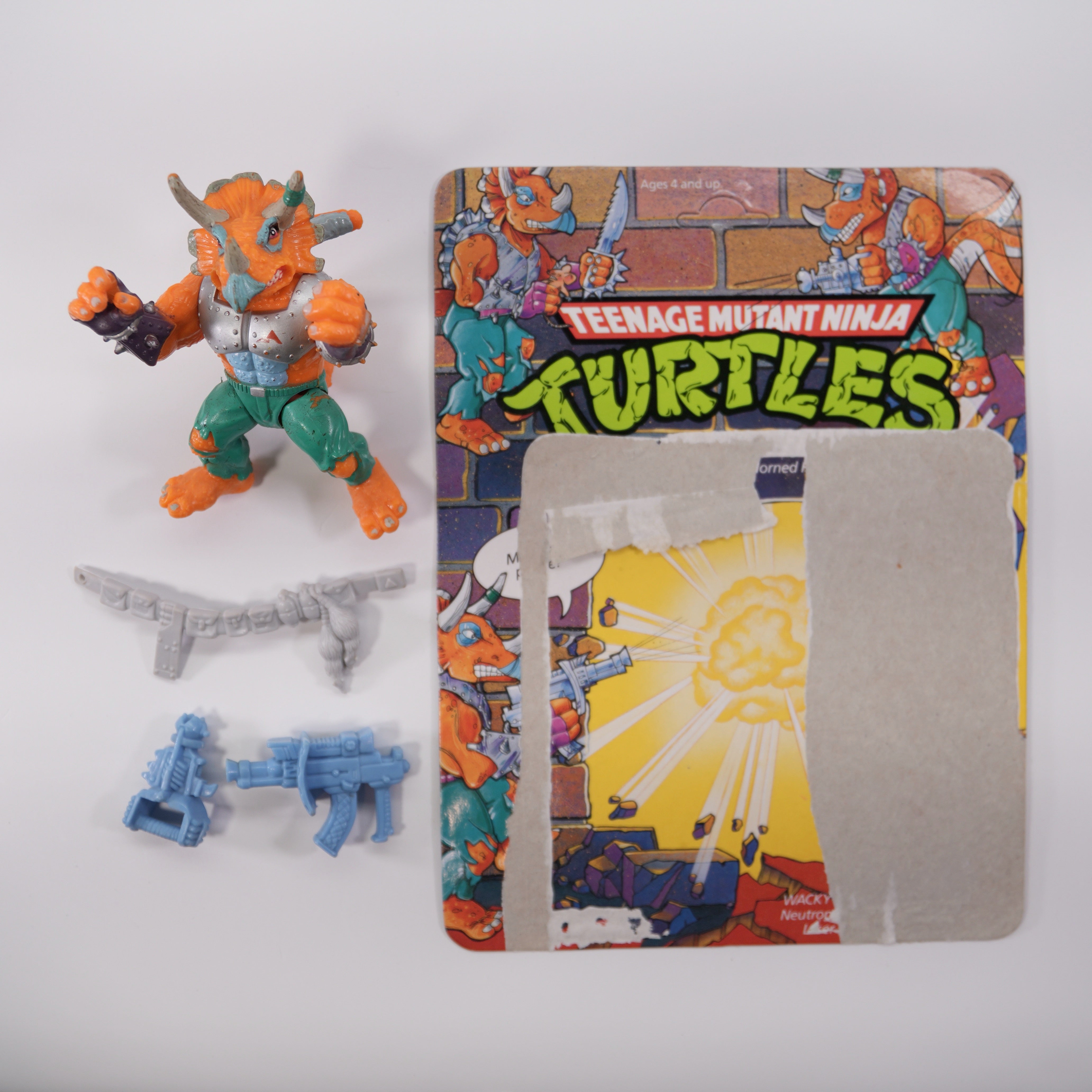 1990 Triceratron TMNT Complete with Figure, Accessories, and Unpunched Cardback (Repaired)