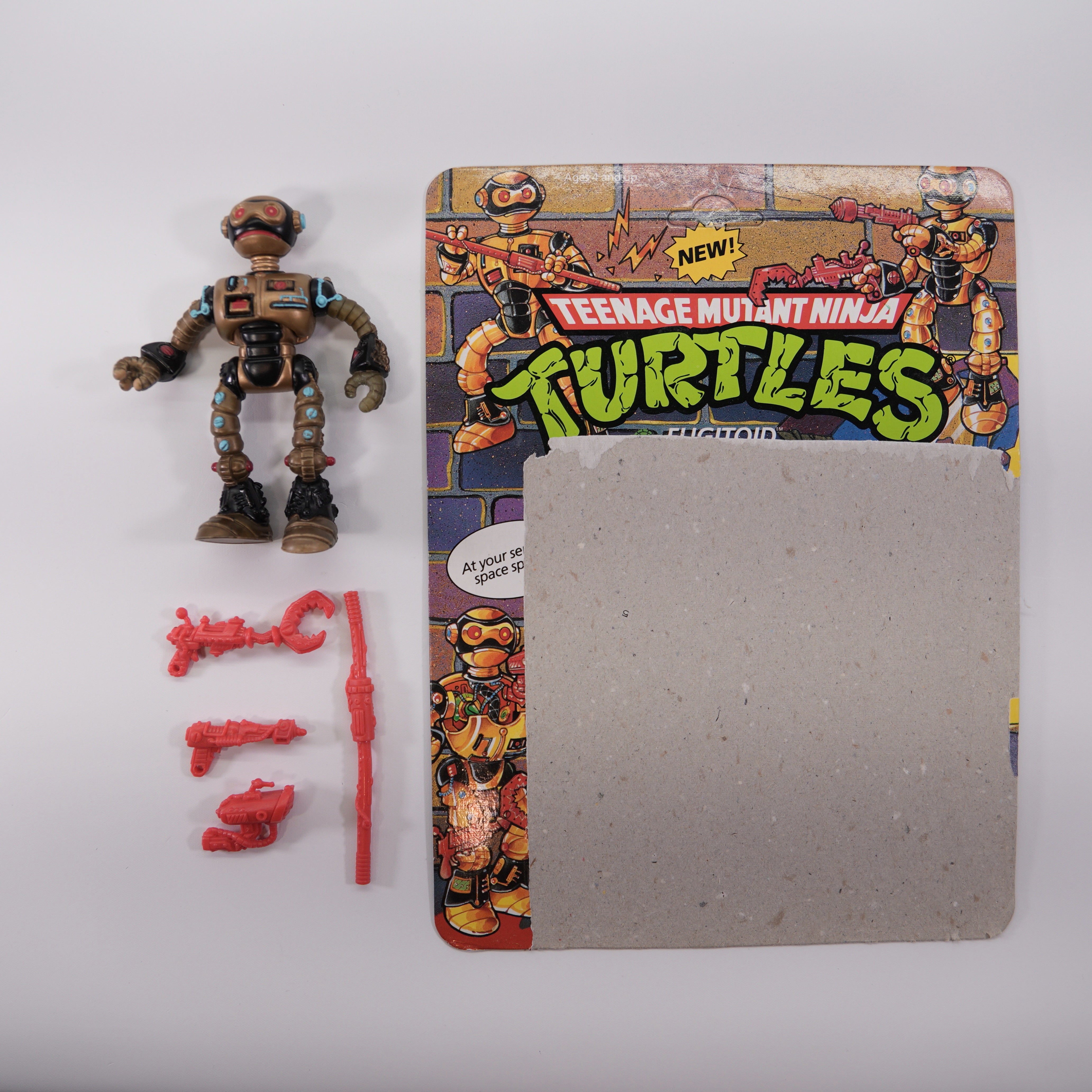 1990 Fugitoid TMNT Complete with Figure, Accessories, and Unpunched Cardback