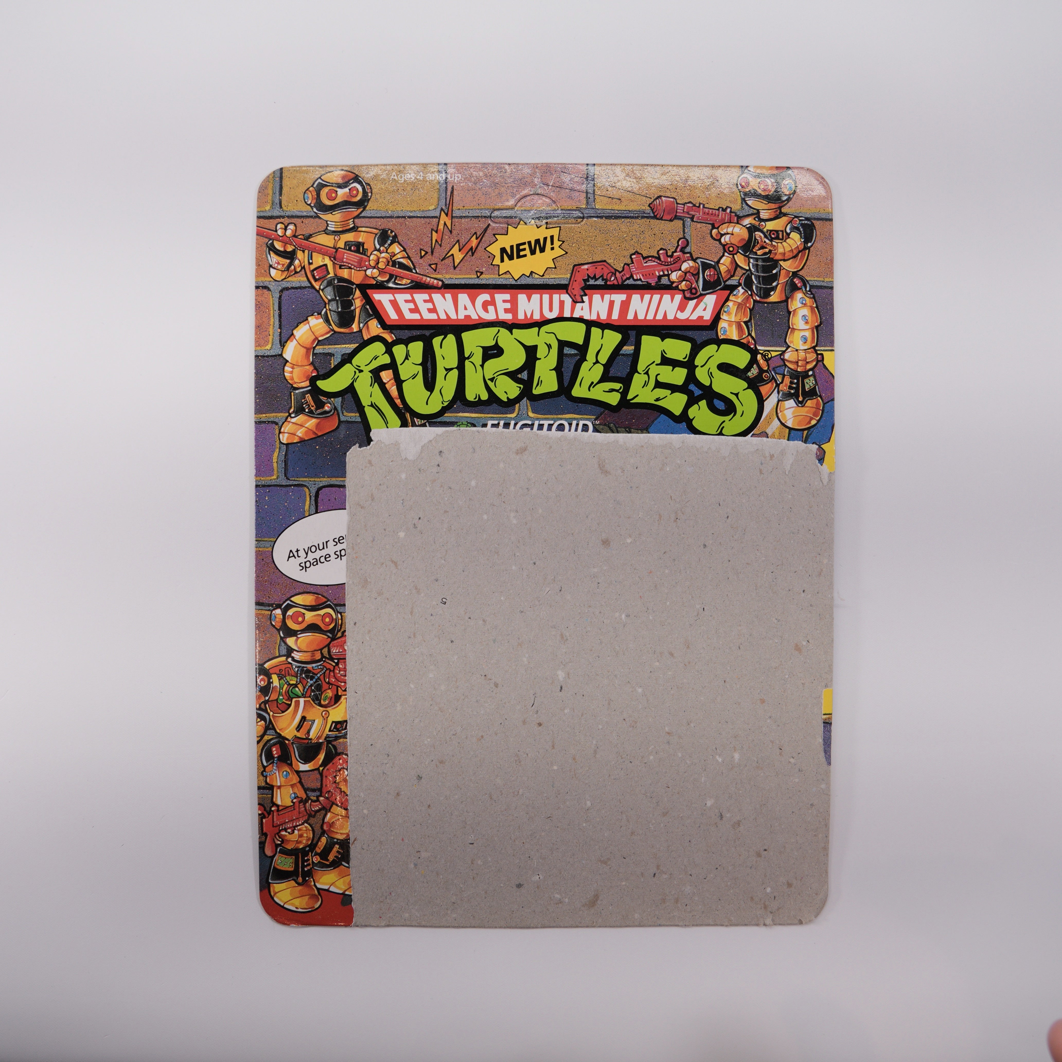 1990 Fugitoid TMNT Complete with Figure, Accessories, and Unpunched Cardback