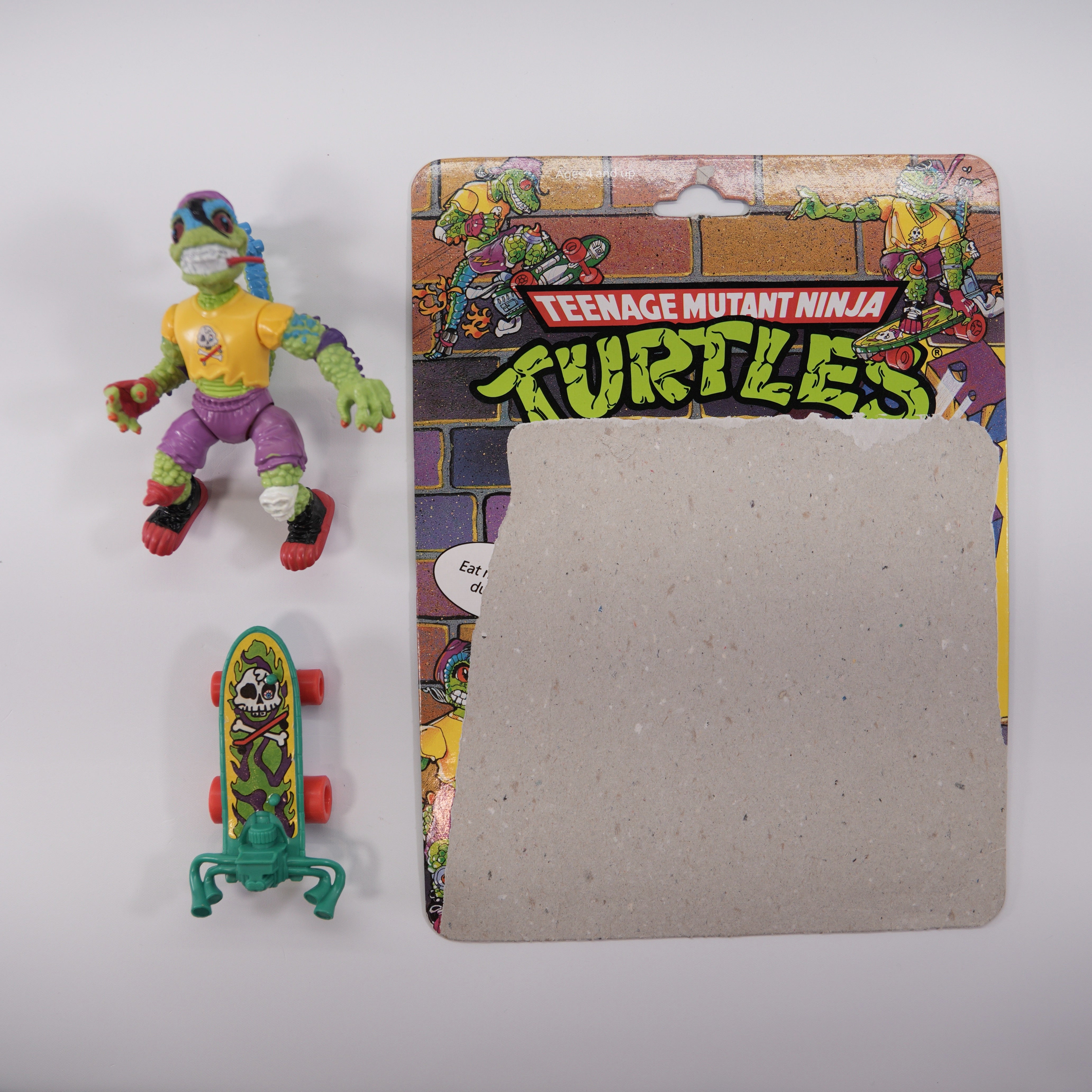 1990 Mondo Gecko TMNT Complete with Figure, Accessory, and Full Cardback