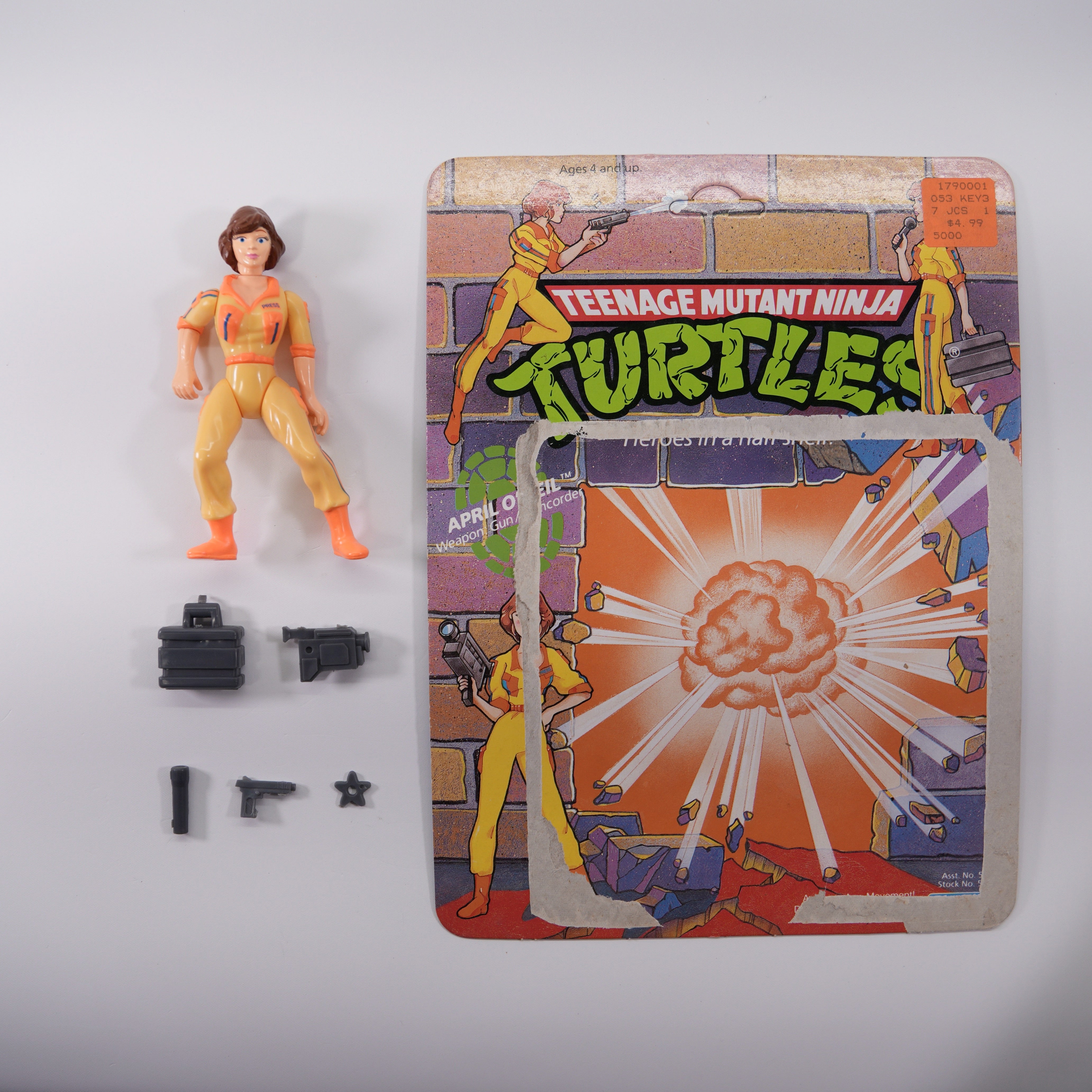 1988 April O'Neil Orange Stripe TMNT Complete with Figure, Accessories, and Unpunched Cardback