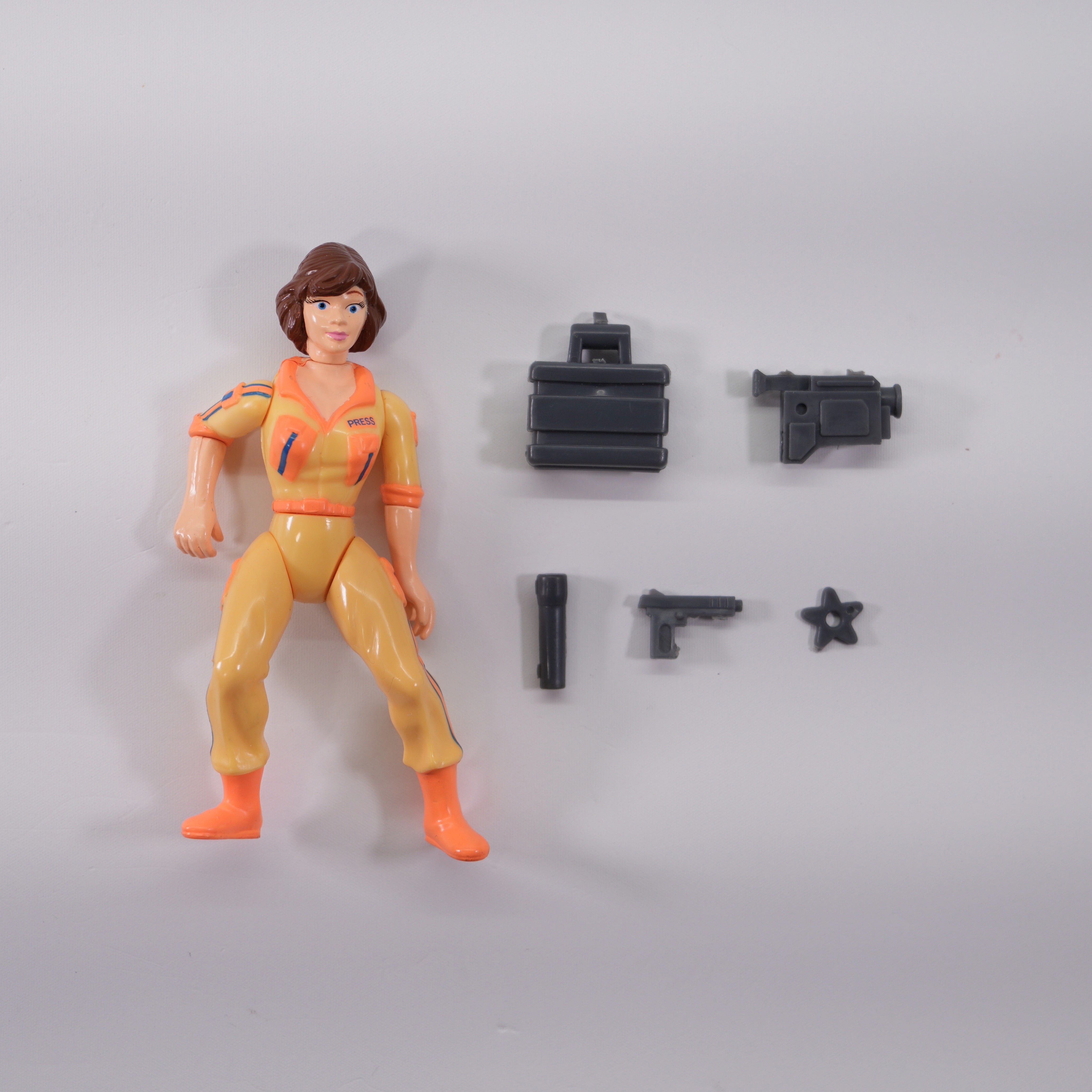 1988 April O'Neil Orange Stripe TMNT Complete with Figure, Accessories, and Unpunched Cardback