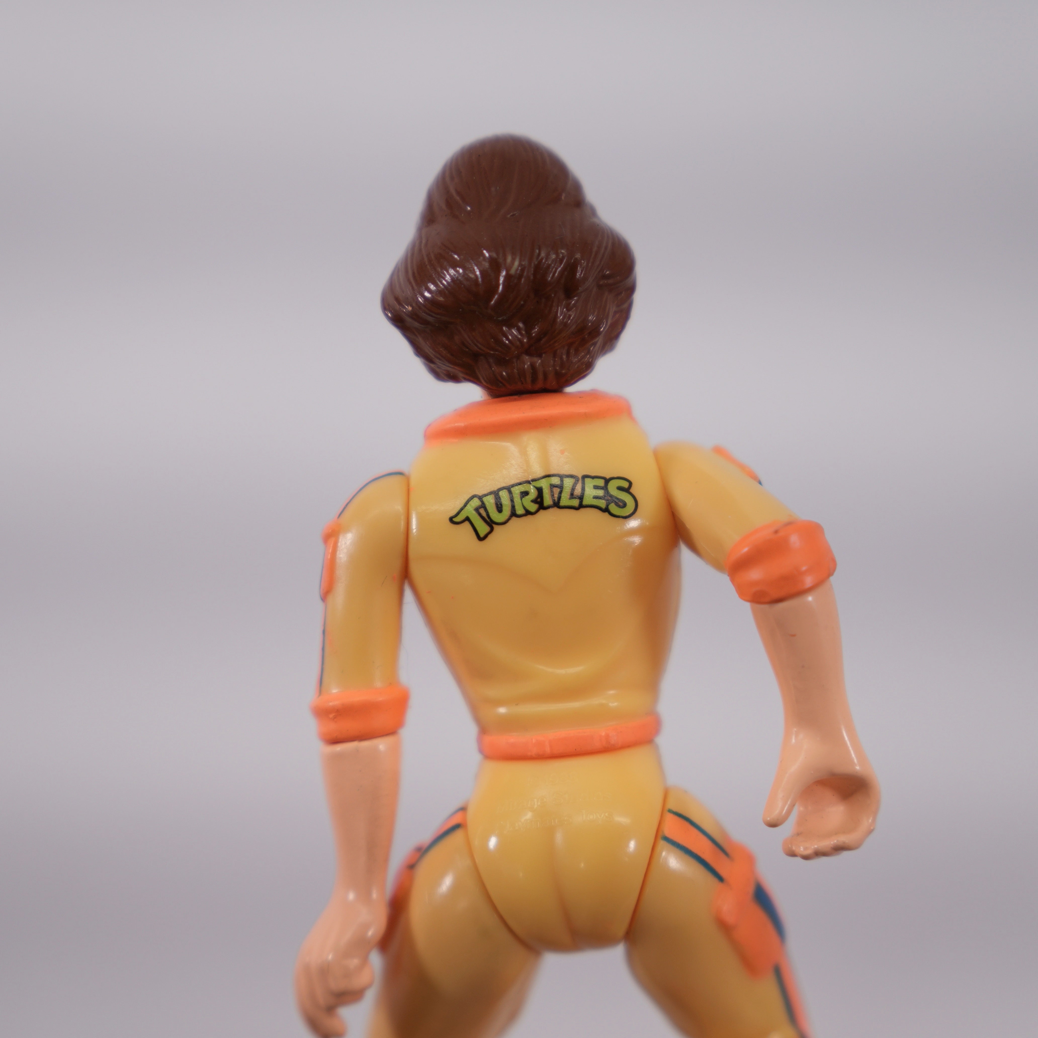 1988 April O'Neil Orange Stripe TMNT Complete with Figure, Accessories, and Unpunched Cardback