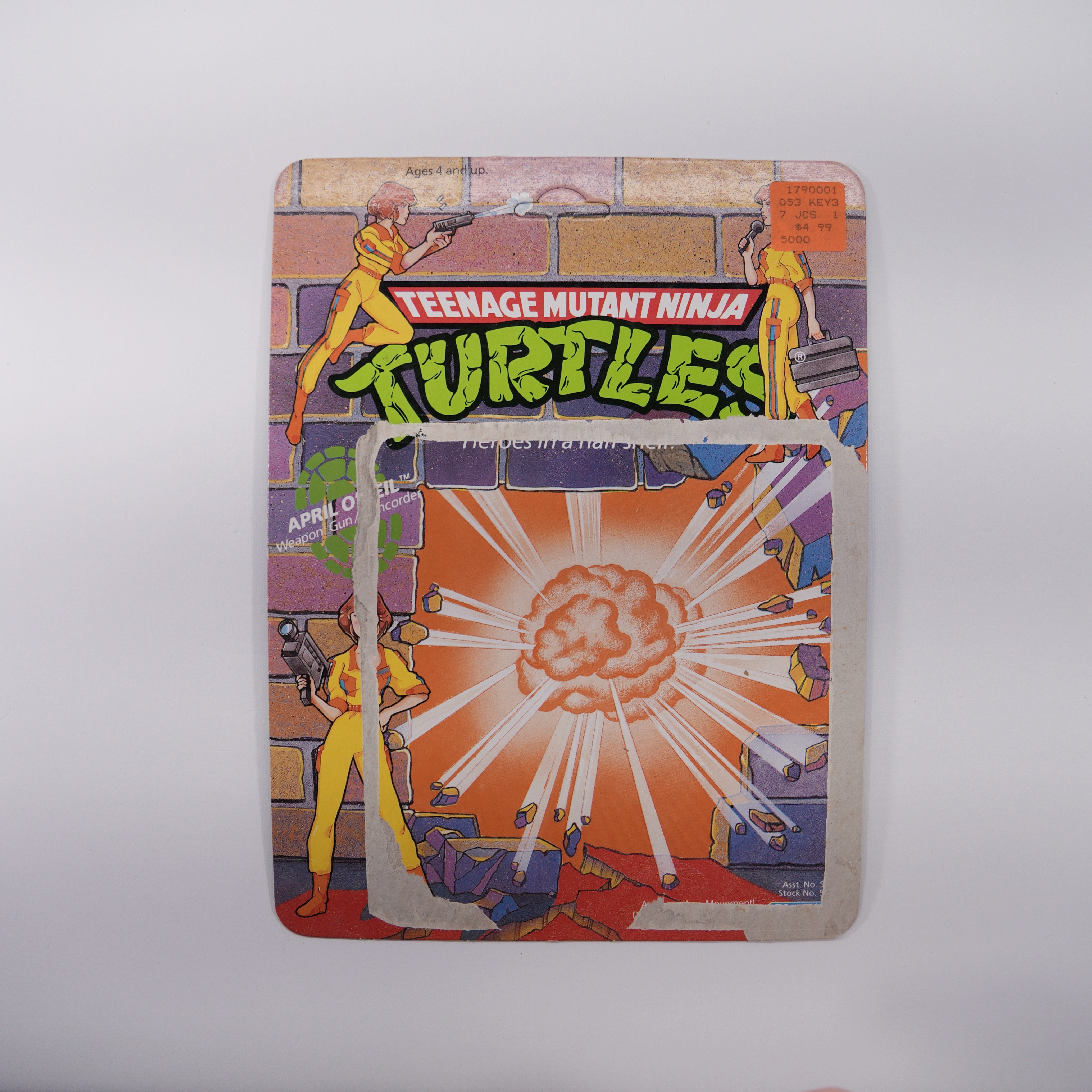 1988 April O'Neil Orange Stripe TMNT Complete with Figure, Accessories, and Unpunched Cardback