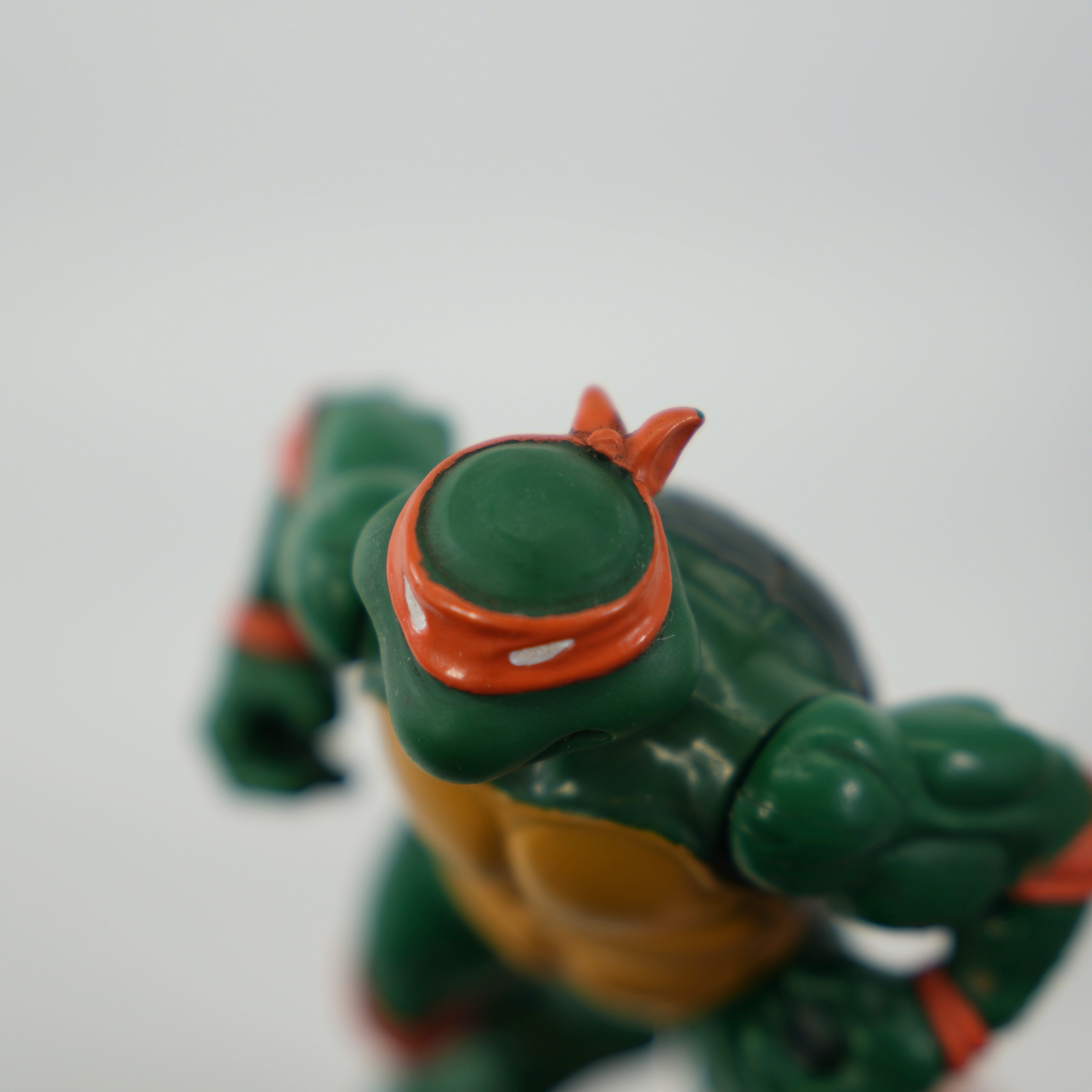 1988 Michaelangelo Soft Head TMNT Complete with Figure, Accessories, and Unpunched 10 Back Cardback