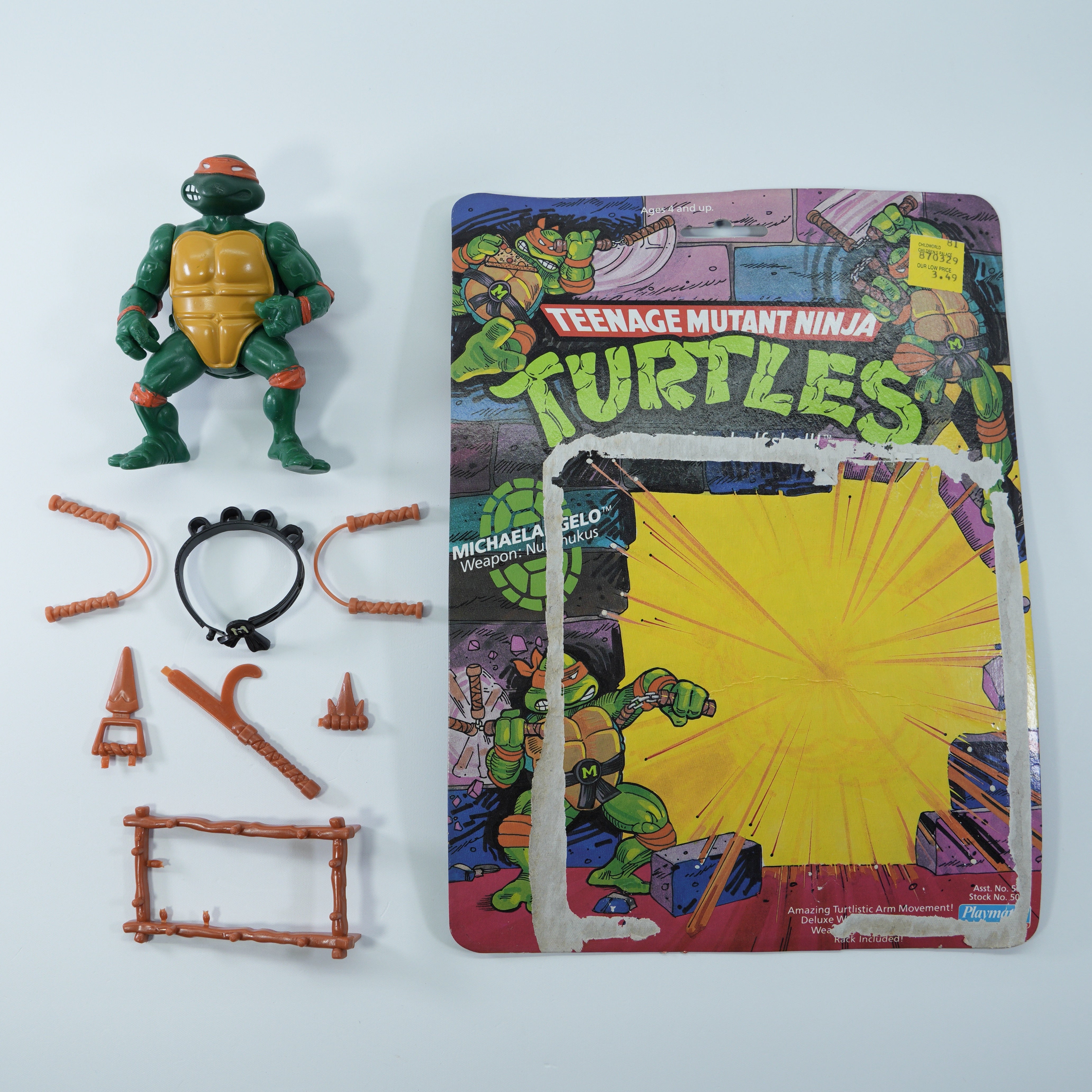 1988 Michaelangelo Soft Head TMNT Complete with Figure, Accessories, and Full 10 Back Cardback